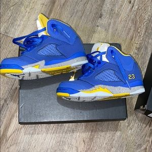 Royal blue and yellow Jordan 5 Laney